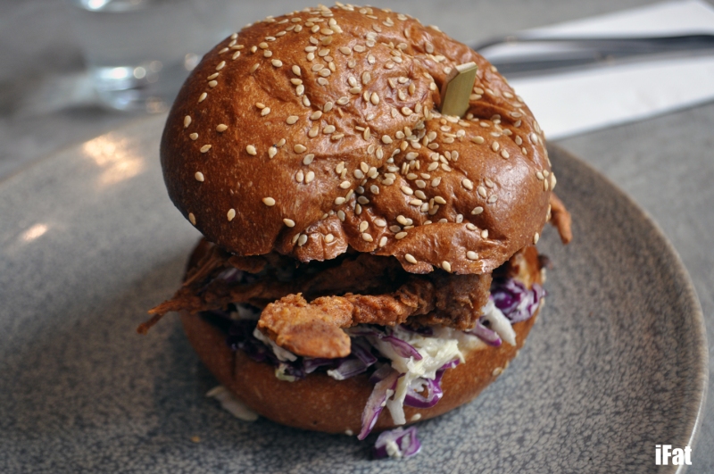 Soft shell crab po boy with slaw, ranch dressing and encased in a buttermilk bun,