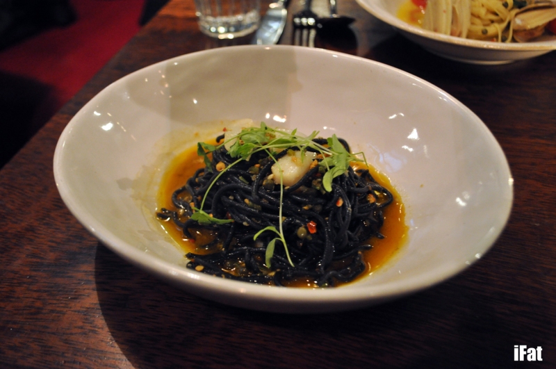 Black angel spaghetti. Squid ink pasta, scallops, garlic, chilli, anchovies, wine & capers.