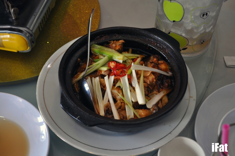 Caramelised fish in a clay pot