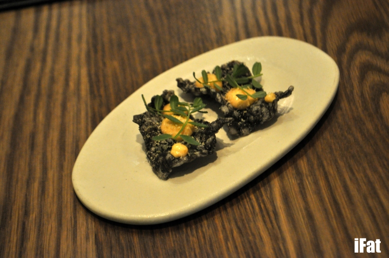 Squid ink crackling with scallop roe